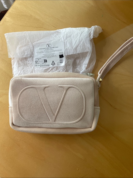 Valentino Garavani Handbags - Valentino Garavani Cream Embossed VLogo Pouch Makeup Bag Rockstud Wristlet